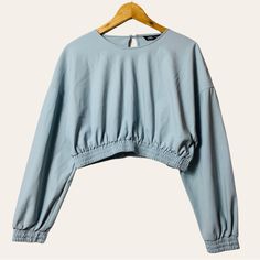 Zara Neoprene Effect Sweatshirt Blue Long Sleeve Elastic Hem Crop Top Keyhole Back Size-Women’s Us S Measurements (Approx.) Length-15.5" Shoulder-Shoulder-24.5" Pit-Pit-20" Sleeve-19.5" -77% Nylon, 33% Elastane -Condition -Nwt Ts-2164 - Date Night, Business Casual, Party, Club Wear, Feminine, Trendy, Oversized, Athleisure, Workout Light Blue Crew Neck Top For Day Out, Chic Blue Long Sleeve Crop Top, Light Blue Long Sleeve Tops For Fall, Chic Blue Crew Neck Top, Trendy Blue Long Sleeve Tops, Zara Stretch Casual Blouse, Casual Cropped Blouse By Zara, Zara Crew Neck Crop Top For Spring, Blue Crew Neck Crop Top For Spring