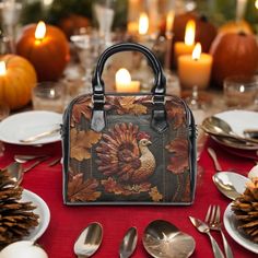 Talk about gobbling up compliments! This cute and sassy handbag features a Thanksgiving turkey with all the charm of tooled leather--but it's actually just a printed image on smooth faux leather. So, while it looks like a fancy embossed design, there's no textured feel, just a stylish illusion that brings the turkey's festive flair to life.  With vibrant colors and that adorable turkey strutting on both sides, this bag is perfect for anyone who's all about the fall vibes and holiday fun. The adj Tom Turkey, Soft Bristle Brush, Thanksgiving Turkey, Leather Material, Baby Bag, Leather Tooling, Shoulder Handbags, Purses And Handbags, Crossbody Bag