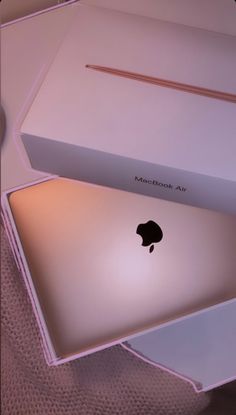 an apple macbook air is sitting in its box