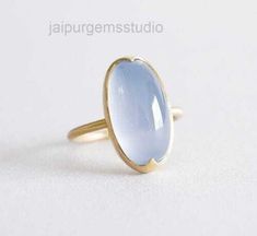 DESCRIPTION :- Chalcedony ring, 925 Sterling Silver chalcedony Ring, natural Chalcedony ring, Oval chalcedony ring, blue and silver chalcedony ring Material: Solid Sterling silver  Stone :- Chalcedony  stone size:- 12X16 mm 925 stamped Handmade item Our products are totally handmade and made with high quality gemstones and sterling silver. -If you believe in buying top quality products for yourself and for your family and friends -Jaipurgemsstudio is the place where you want to be There are uniq Blue Chalcedony Ring, Natural Emerald Rings, Handmade Sterling Silver Rings, Chalcedony Stone, Chalcedony Ring, Ring Blue, Agate Ring, Ring Oval, Gem Stones