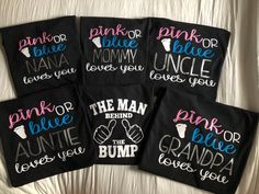 four black shirts with pink or blue mom, the man behind the bump and other words on them