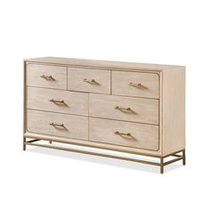 a white dresser with gold handles on it's sides and drawers, against a white background