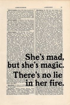 an old book with black ink on it and the words she's mad, but she's magic there's no life in her fire