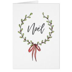 a card with the word noel on it and a red ribbon tied around its neck