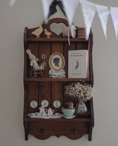 there is a shelf with buttons and other things on it