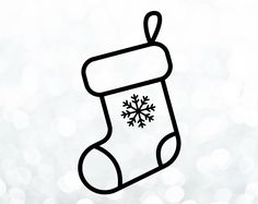 a christmas stocking with snowflakes hanging from it's side on a white background