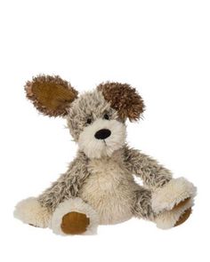 a small stuffed dog with brown ears sitting on a white background and looking at the camera