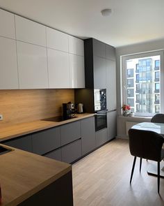 the kitchen is clean and ready for us to use in its new home, with modern appliances