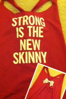 a red tank top with the words strong is the new skinnyy printed on it