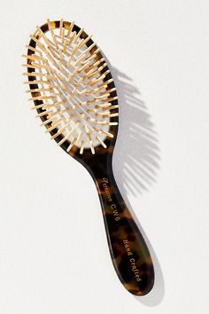 Birchwood bristles; cellulose acetate Imported | Hand-Crafted Italian-Made Hair Brush by Creative Pro Hair Tools in Brown, Women's at Anthropologie Fancy Hair Brush, Wood Hair Brush, Pretty Hairbrush, Aesthetic Hairbrush, Hair Brush Aesthetic, Scandi Accessories, Hair Tools Aesthetic, Hair Rollers Aesthetic, Bamboo Hair Brush