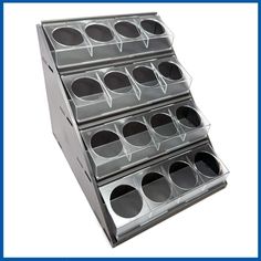 This set includes   1 x Hobby Rack Desktop 4 x Hobby bench w/ 4 Hole Insert (for Painting Pots and other larger bottle size paints) 12 x Magnets (15mm x 2mm)   The Cobalt Keep Hobby Rack system can be used in single racks or expanded with multiple racks to fit your needs. This new storage and organization system can grow as you make your way through this wonderful Hobby of Miniature Painting.   The removable Paint Benches enable you to store your paint away from your desk, while keeping it easily accessible and transportable. Magnets in the Paint Benches keep your paints in place as you shift the Hobby Rack from place to place.    The Hobby Storage Rack is a 7-piece storage system that easily snaps together and is infinitely expandable. No glue or screws required; you can simply snap toget Painting Pots, Hobby Storage, Painted Benches, Racking System, Organizing Systems, Rack Shelf, Bottle Sizes, Bottle Painting, Painted Pots