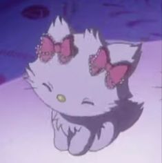 an animated image of a hello kitty with pink bows on it's head and eyes