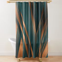 a shower curtain with an abstract design on the front and back panels in gold, teal, and brown