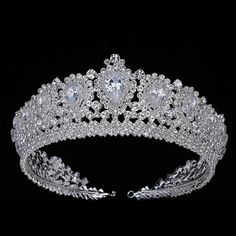 Brand Name: HADIYANAMetals Type: CopperFine or Fashion: FashionMaterial: Cubic ZirconiaType: TiarasGender: WomenStyle: ClassicItem Type: HairwearShape\\pattern: Water DropPlated:: Silver/gold Plating GuaranteedStyle:: Bridal Hair TiarasPattern: Wedding CrownHeight: 5.4cmwidth: 13cmMain stone: cubic zinconiaMaterial: copper,brass Bridal Jewlery, Bridal Hair Tiara, Bridal Crown Tiara, Crystal Bridal Headpiece, Pageant Crowns, Rhinestone Tiara, Bling Wedding, Crystal Tiaras, Hair Jewelry Wedding