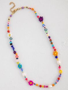 Boho Beaded Daisy & Pearl Choker – Natural Life Daisy Necklace Beads, Colorful Flower-shaped Beaded Necklaces For Summer, Flower-shaped Colorful Beaded Necklaces For Summer, Summer Flower-shaped Beaded Necklaces With Colorful Beads, Colorful Beaded Necklaces For Spring, Colorful Round Beaded Necklaces For Spring, Spring Colorful Beaded Necklaces, Colorful Beads Spring Festival Necklace, Multicolor Beaded Chain Necklace For Spring