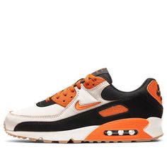 The Nike Air Max 90 'Home Away Safety Orange' is a stylish sneaker that features a classic color scheme of black and Sail with Safety Orange accents. The Swoosh is designed in a mini, 3D jelly texture, and the leather edges of the upper reveal a scratch-off layer that reveals a Safety Orange upper. The tongue features a compass graphic with Home and Away lettering, and a security buckle is included with the same graphic. This sneaker is perfect for everyday activities and is sure to make a statement. The Air Max 90 series is inspired by the outdoors and will keep you comfortable and stylish. (SNKR) Airmax 90s, Compass Graphic, Chicano Style, Air Max 90s, Chicano Style Tattoo, Air Shoes, Style Tattoo, Nike Air Shoes, A Compass