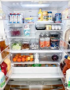 an open refrigerator filled with lots of food