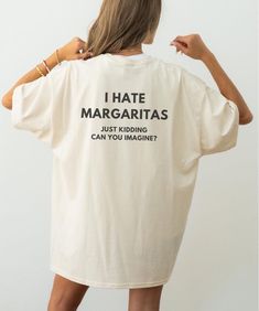 ** PRINT ON BACK ONLY** Introducing the "I Hate Margaritas, Just Kidding Can You Imagine" t-shirt, the perfect blend of humor and style for cocktail lovers!  This funny drinking shirt is designed for anyone who appreciates a good laugh while indulging in their favorite drinks like an espresso martini or a refreshing gin and tonic. Made from comfortable materials, this cocktail graphic tee is an ideal gift for mixologists and bachelorette parties alike. With its fun and quirky design, it's the ul Oversized White T-shirt With Funny Print, May Contain Alcohol Shirt, I Need A Huge Margarita Shirt, Expresso Martini, Margarita Shirt, Margarita Memes Hilarious, Funny Drinking Shirts, Gin Tonic, Meme Tshirts