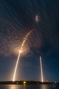 the space shuttle is flying through the night sky