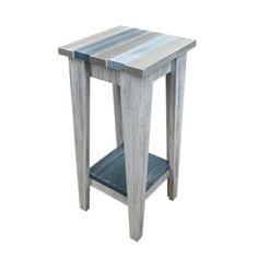 a small wooden table with one shelf on the side