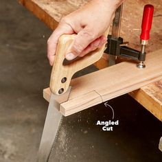 a person using a woodworking tool to cut planks with a planer blade