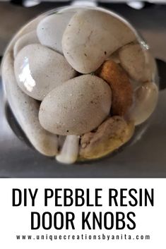 a bowl filled with rocks sitting on top of a table