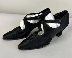 You'll glide like silk across the dance floor in these 1920's pumps! Black silk Mary Janes are given a twist with a criss crossing strap with button fastener. They have pointy toes, block heels, and leather soles. These shoes are in great vintage condition with expected wear for age. Marked size EU 37 (translates to a US Size 6.5), please see the measurements for accuracy: Insole Length: 9.5" Outer Width: 2.75" Heel Height: 2.5" Find our other vintage splendid shoes here: https://www.etsy.com/shop/OverAttiredVintage?section_id=19096587  Within the US, we ship our shoes in padded flat rate envelopes. If you would prefer them to be sent in a medium flat rate box, please choose that option at checkout. International shipments will be packaged in a box to ensure safe delivery. Every additional 1920s Shoes, Womens Mary Janes, Mary Jane Shoes Womens, Strap Pumps, Dance Floor, Black Silk, Antique Vintage, Criss Cross, Mary Janes