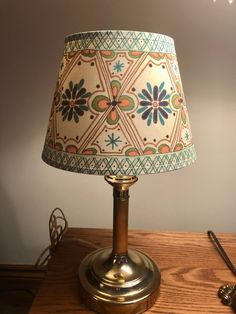 a lamp that is on top of a table