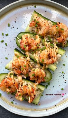 shrimp and zucchini boats on a white plate