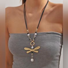 This Gorgeous Dragonfly Necklace Is A Must-Have For Any Fashion-Forward Individual. The Elegant Beading And Vintage Design Add A Touch Of Boho Chic To Any Outfit. Measuring 25 Inches With A 3 Inch Extension, This Necklace Is Perfect For Layering Or Wearing Alone. The Dragonfly Pendant Adds A Touch Of Whimsy To The Piece, Making It A Beautiful Addition To Any Jewelry Collection. It Is Brand New With Tags And Ready To Be Worn And Cherished. Item 03 Family Jewelry, Large Pendant Necklace, Pearl Necklace Designs, Bold Necklace, Nice Jewelry, Dragonfly Necklace, D Design, Art Necklaces, Pearl Decor