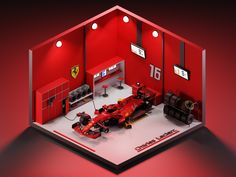 a red race car is parked in front of the pit area at ferrari's garage