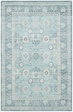 a light blue rug with an ornate design on the top and bottom, in different colors