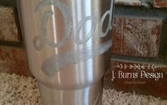 a metal cup sitting on top of a counter