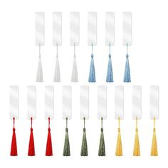 a set of twelve different colored tassels