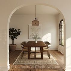 an archway leads into the dining room