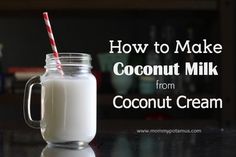 a mason jar filled with coconut milk and the words how to make coconut milk from coconut cream