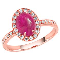 Indulge in the captivating beauty of this exquisite cocktail ring, meticulously crafted to offer elegance and sophistication. Main Features: Center Stone: A mesmerizing 1.60-carat cabochon Burma pink sapphire, certified by GIA (Gemological Institute of America). This rare gemstone showcases a natural, untreated allure with no indications of heating, enhancing its value and uniqueness. GIA Certification: GIA Report Number 6234250644 ensures the authenticity and quality of the center sapphire, con Gold Cocktail Ring, Halo Setting, Diamond Cocktail Rings, Diamond Settings, Rare Gemstones, No Heat, Halo Diamond Ring, Belleza Natural, Micro Pave