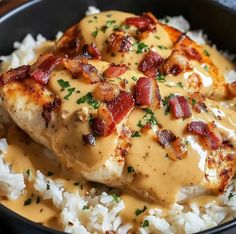 chicken with gravy and bacon on top of rice in a black skillet