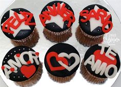 six decorated cupcakes with red and white frosting that say i love you