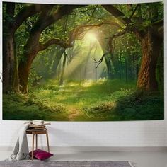 an image of a forest with sunlight coming through the trees tapestry wall hanging art print