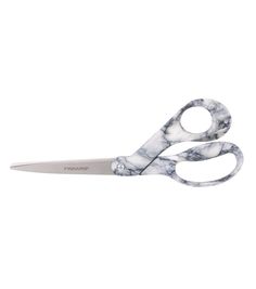 a pair of marbled scissors on a white background