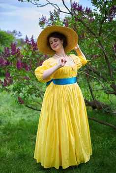 This vivid and bright summer dress was highly inspired by the portrait of Mary Hawkworth Riddell and her daughter Agnes (1791) made by Charles Peale Polk. This gown associates with French Queen Marie-Antoinette who wears it on the famous portrait exhibited at the Paris Salon in 1783. It is a perfect choice for informal late 18th century summer events. Made of cheer lightweight cotton it is 100% breathable.  The gowns the front opening which is closed on ties (the upper one is for the neckline gathering, the second one is under the bust and the third one is on the waist). The costume consists of the gown, two petticoats, a waist padding and a blue belt. The dress is made to measure. If you'd like to purchase, please, fill the Personalization section or let me know about your measures in pri Victorian Dress For Summer Garden Party, Summer Cotton Regency Dress, Regency Style Cotton Summer Dress, Summer Regency Style Cotton Dress, Spring Regency Style Victorian Dress Costume, Regency Style Prairie Dress For Summer Garden Party, Summer Regency Prairie Dress For Garden Party, Regency Style Summer Prairie Dress For Garden Party, 18th Century Chemise