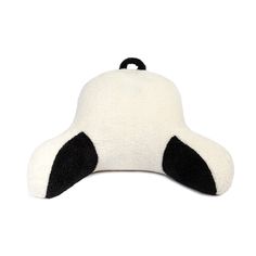 a white and black panda bear shaped pillow