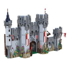 a castle made out of legos on a white background