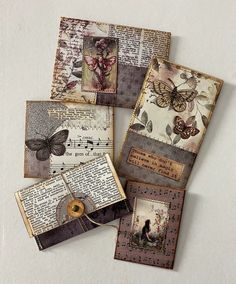 four different pieces of altered paper with butterflies and music notes attached to the sides of them