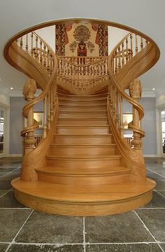 a large wooden staircase in the middle of a room