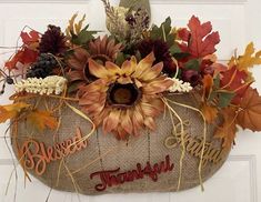 a burlock filled with fall leaves and flowers