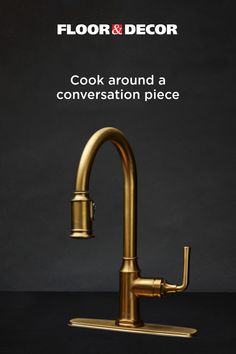 a gold faucet with the words floor and decor on it