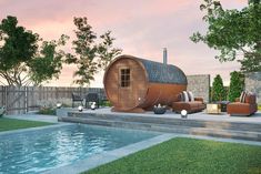 a large wooden barrel sitting next to a swimming pool