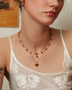 Materials: 18k gold plated brass, red glass beads Measurements: 390mm/15.35" in length, 50mm/1.97" in extension length Red Gold Necklace, Red Beaded Necklace, En Route Jewelry, Tulip Necklace, Red Beaded Necklaces, Red Quartz, Gemstone Beaded Necklace, Garnet Pendant, Red Necklace